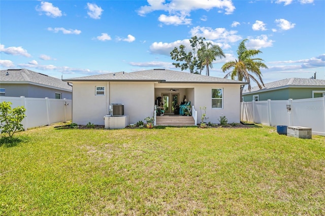6741 51st Way N, Pinellas Park, FL 33781 - rear view of property featuring a ceiling fan, stucco siding, and central AC unit