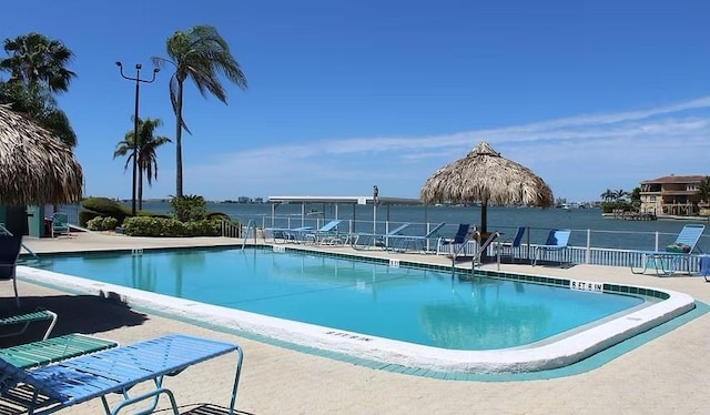 6075 Shore Blvd S Unit 215, Gulfport, FL 33707 - community pool featuring a water view and a patio area