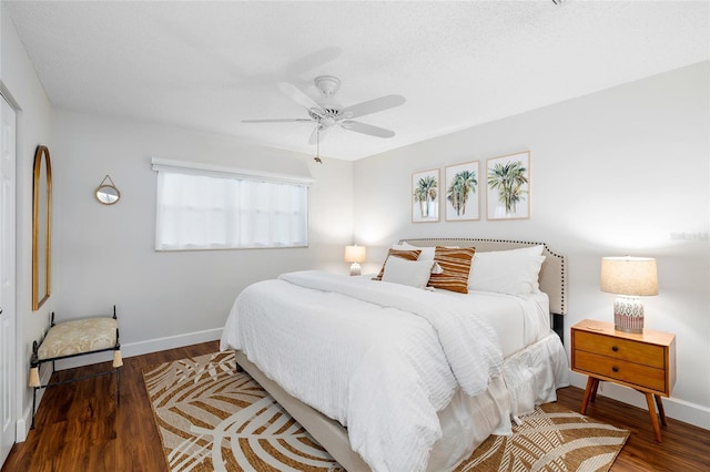 6075 Shore Blvd S Unit 215, Gulfport, FL 33707 - bedroom with wood finished floors, baseboards, and a ceiling fan
