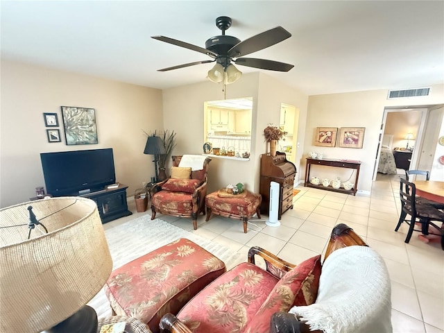 102 Cambridge Trl Unit 230, Sun City Center, FL 33573 - living room featuring tile patterned flooring and ceiling fan