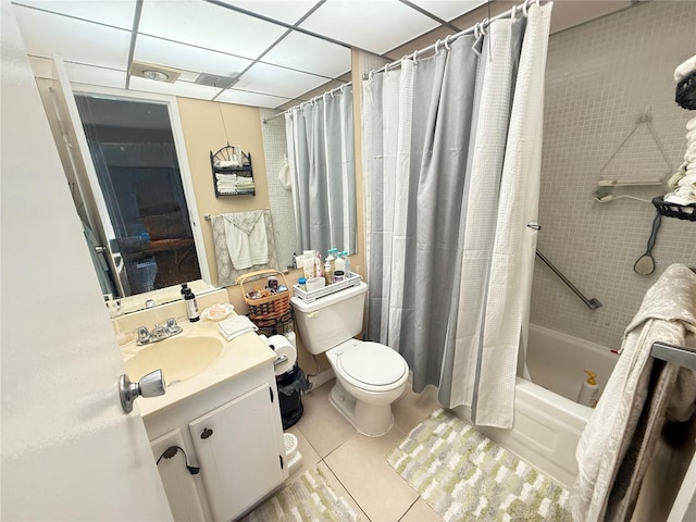 102 Cambridge Trl Unit 230, Sun City Center, FL 33573 - full bath featuring vanity, toilet, tile patterned flooring, and shower / bath combo with shower curtain