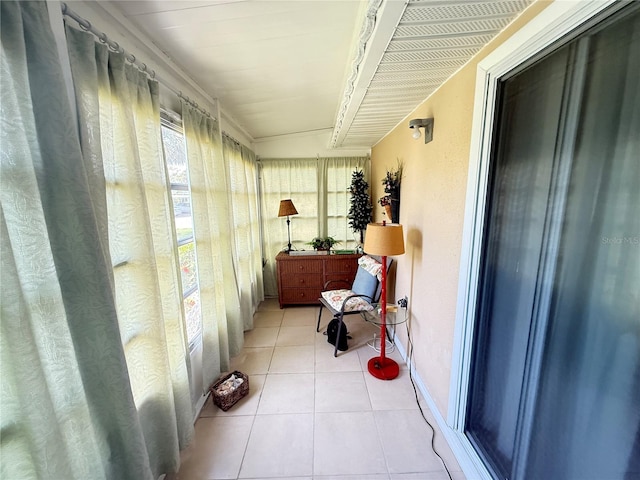 102 Cambridge Trl Unit 230, Sun City Center, FL 33573 - sunroom featuring tile patterned floors and baseboards