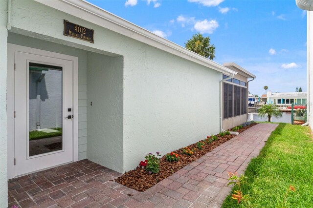 4012 Marine Pkwy, New Port Richey, FL 34652 - entrance to property with stucco siding
