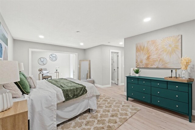 4012 Marine Pkwy, New Port Richey, FL 34652 - bedroom with wood finished floors, recessed lighting, and baseboards