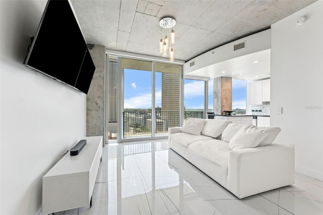 777 N Ashley Dr Unit 1506, Tampa, FL 33602 - living room with baseboards and floor to ceiling windows