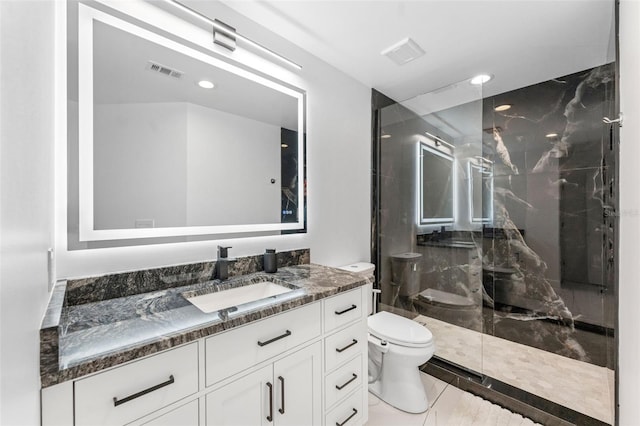 777 N Ashley Dr Unit 1506, Tampa, FL 33602 - full bathroom with a marble finish shower, vanity, toilet, and recessed lighting