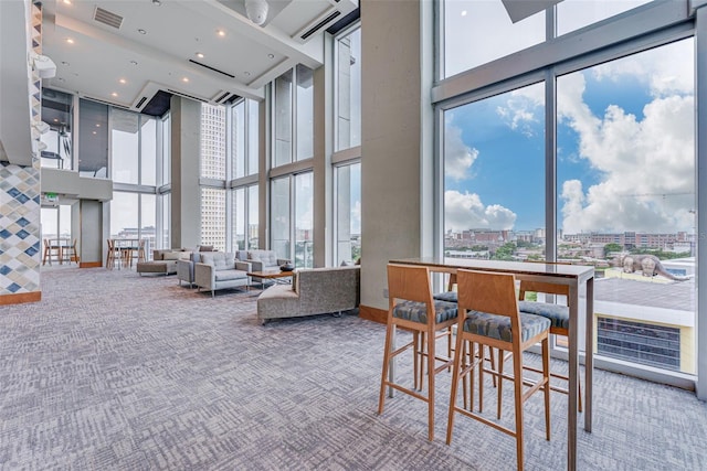 777 N Ashley Dr Unit 1506, Tampa, FL 33602 - common area with a high ceiling, a view of city, and recessed lighting
