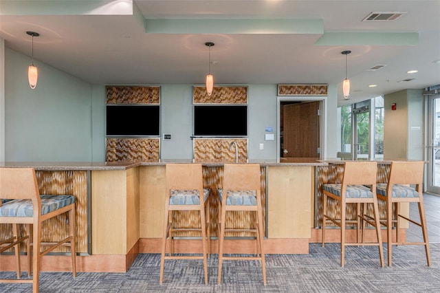 777 N Ashley Dr Unit 1506, Tampa, FL 33602 - bar with a sink, decorative light fixtures, and recessed lighting