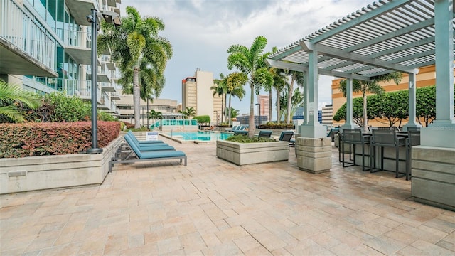 777 N Ashley Dr Unit 1506, Tampa, FL 33602 - view of patio featuring a pergola and a community pool