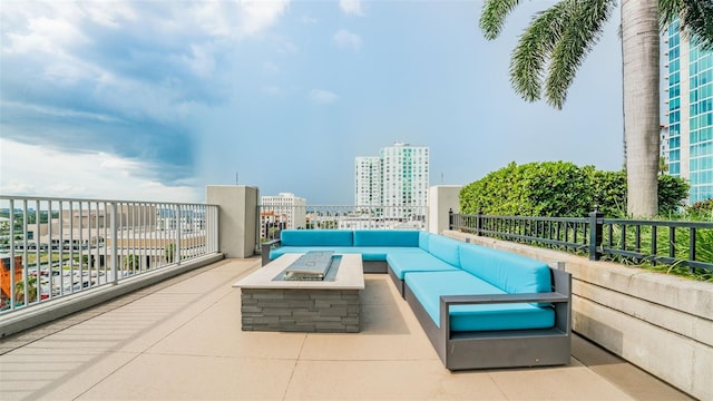 777 N Ashley Dr Unit 1506, Tampa, FL 33602 - view of patio featuring an outdoor living space with a fire pit and a view of city