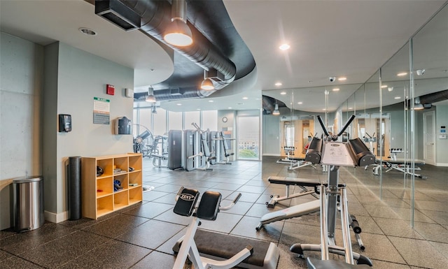 777 N Ashley Dr Unit 1506, Tampa, FL 33602 - exercise room featuring baseboards and recessed lighting