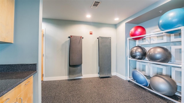777 N Ashley Dr Unit 1506, Tampa, FL 33602 - exercise room with baseboards and recessed lighting