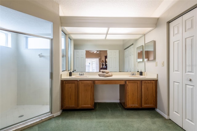 2024 Glen Forge St, Brandon, FL 33511 - full bath with double vanity, a shower stall, baseboards, carpet, and a ceiling fan
