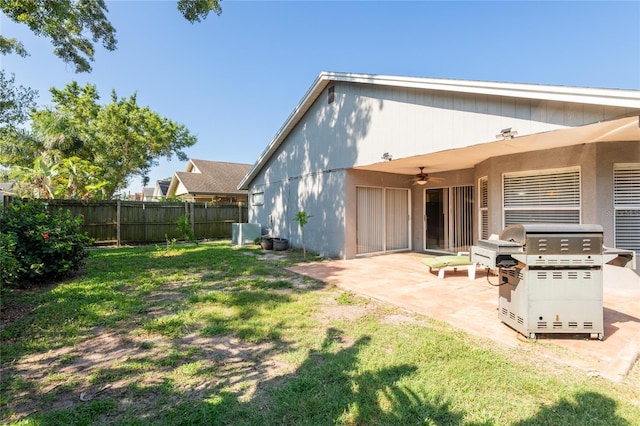 2024 Glen Forge St, Brandon, FL 33511 - rear view of house with a ceiling fan, a patio area, and central AC