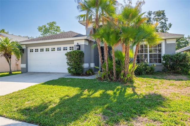 2024 Glen Forge St, Brandon, FL 33511 - view of front of house with stucco siding, concrete driveway, an attached garage, and a front lawn
