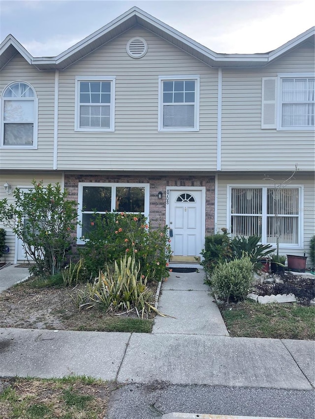 8708 Cobbler Pl, Tampa, FL 33615 - view of townhome / multi-family property