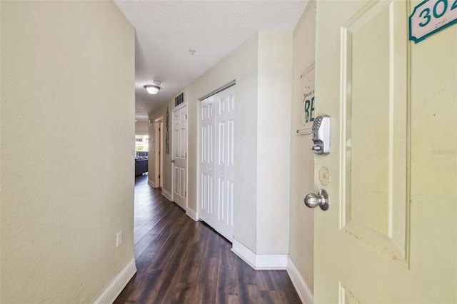 10315 Gulf Blvd Unit 302, Saint Petersburg, FL 33706 - hall featuring wood finished floors and baseboards