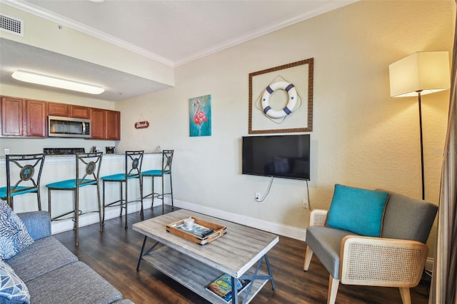 10315 Gulf Blvd Unit 302, Saint Petersburg, FL 33706 - living room featuring crown molding, dark wood-style floors, and baseboards