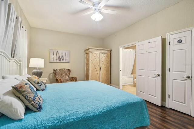 10315 Gulf Blvd Unit 302, Saint Petersburg, FL 33706 - bedroom with wood finished floors, connected bathroom, and a ceiling fan