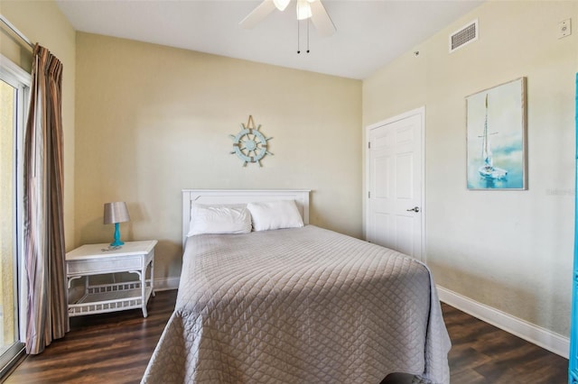 10315 Gulf Blvd Unit 302, Saint Petersburg, FL 33706 - bedroom featuring wood finished floors, baseboards, and ceiling fan