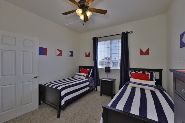 bedroom with carpet floors and ceiling fan