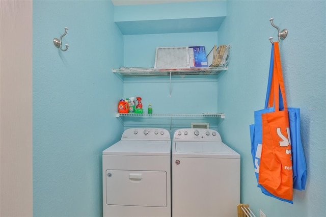 laundry area featuring independent washer and dryer