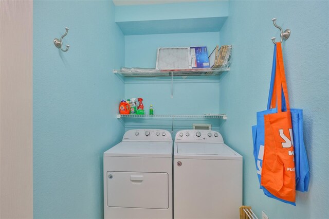 laundry area featuring independent washer and dryer
