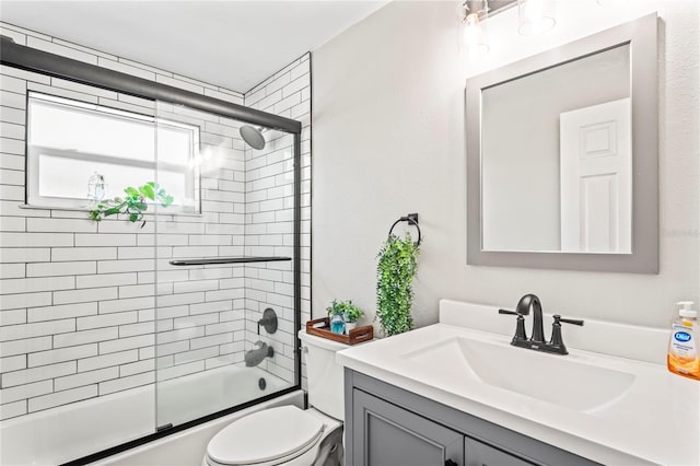6137 Halifax Dr, New Port Richey, FL 34653 - full bathroom with vanity, toilet, and bath / shower combo with glass door