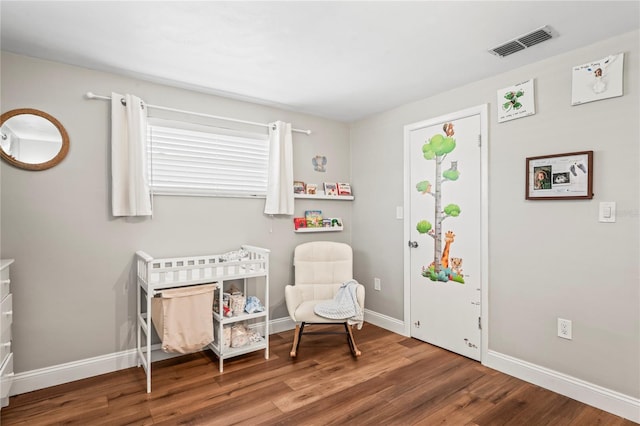 6137 Halifax Dr, New Port Richey, FL 34653 - living area with wood finished floors and baseboards