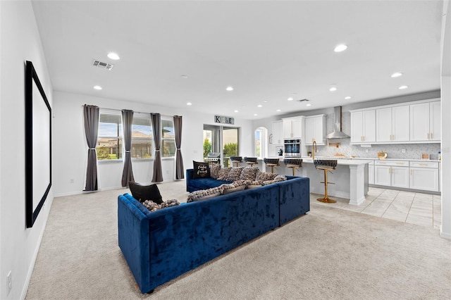 33255 Kateland Dr, Wesley Chapel, FL 33545 - living room featuring recessed lighting, light colored carpet, and baseboards