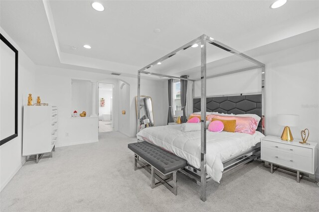 33255 Kateland Dr, Wesley Chapel, FL 33545 - carpeted bedroom with recessed lighting, decorative columns, baseboards, and arched walkways