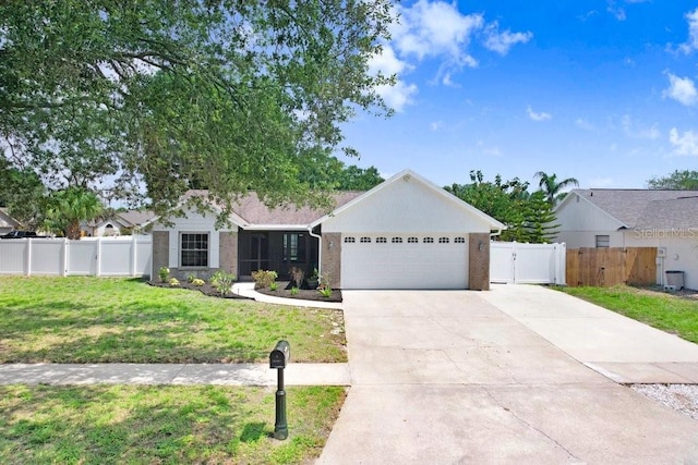 1017 Cameo Crest Ln, Valrico, FL 33596 - ranch-style home with a garage, concrete driveway, and a gate