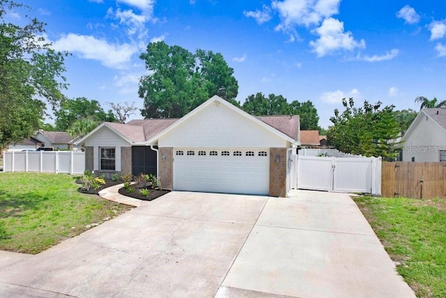 1017 Cameo Crest Ln, Valrico, FL 33596 - ranch-style home with a garage, a gate, brick siding, and concrete driveway