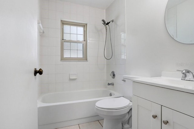 1017 Cameo Crest Ln, Valrico, FL 33596 - bathroom with toilet, vanity, tub / shower combination, and tile patterned flooring