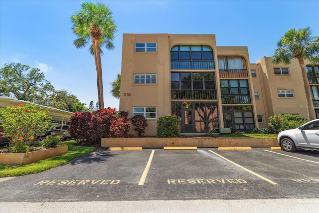 11485 Oakhurst Rd Unit 200-101, Largo, FL 33774 - view of property with uncovered parking