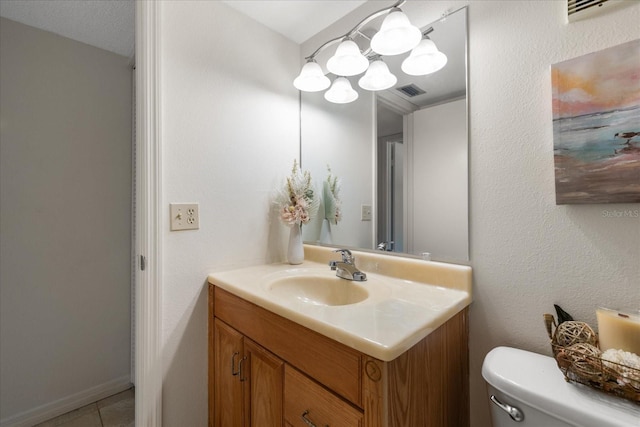 11485 Oakhurst Rd Unit 200-101, Largo, FL 33774 - bathroom with vanity, toilet, a chandelier, and tile patterned floors