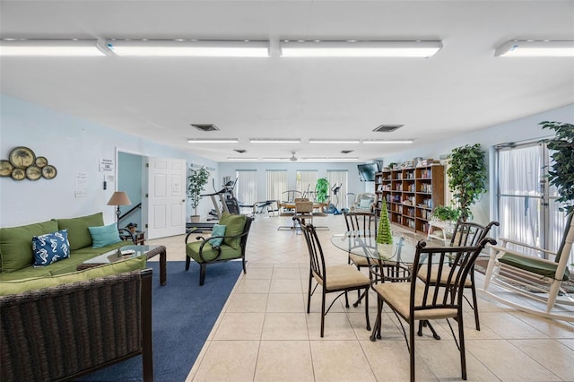 11485 Oakhurst Rd Unit 200-101, Largo, FL 33774 - dining space featuring light tile patterned floors