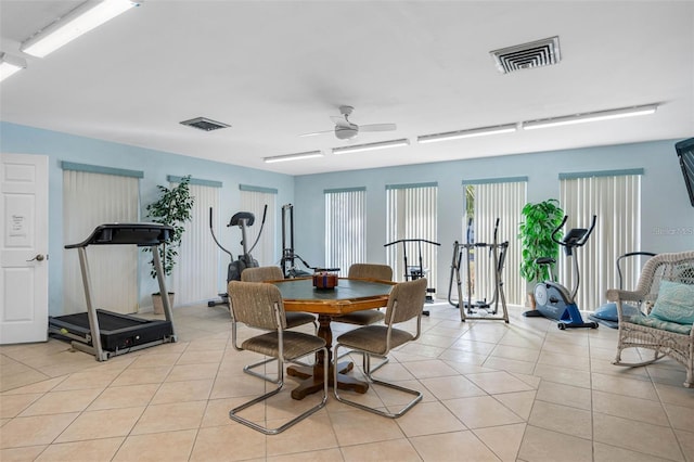 11485 Oakhurst Rd Unit 200-101, Largo, FL 33774 - dining area featuring light tile patterned floors and ceiling fan