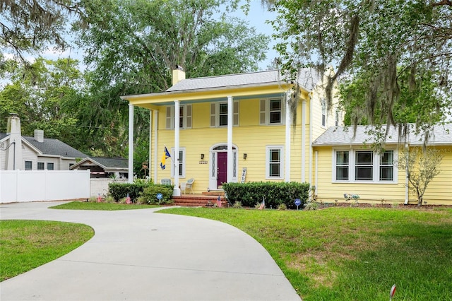 1226 SE 9th Ave, Ocala, FL 34471 - greek revival inspired property with a chimney and curved driveway