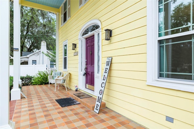 1226 SE 9th Ave, Ocala, FL 34471 - view of exterior entry with a porch