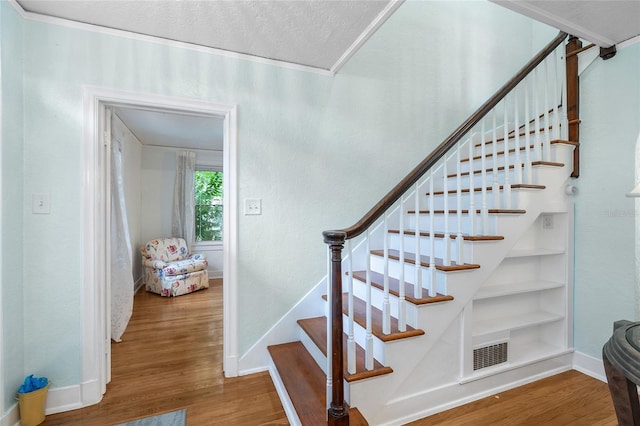 1226 SE 9th Ave, Ocala, FL 34471 - stairway with baseboards and wood finished floors