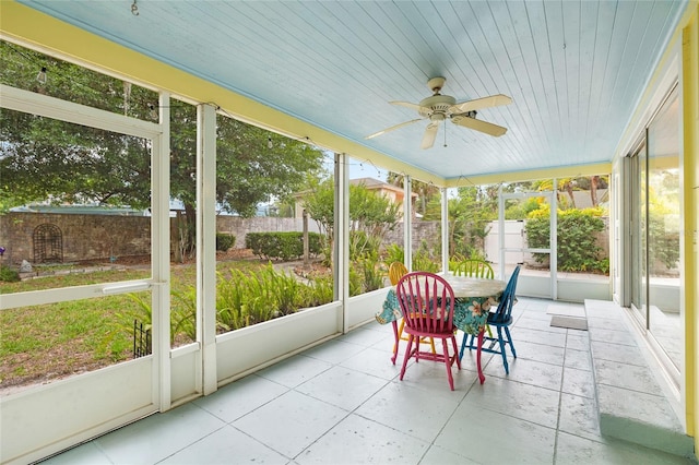1226 SE 9th Ave, Ocala, FL 34471 - sunroom / solarium featuring a ceiling fan, healthy amount of natural light, and outdoor dining space