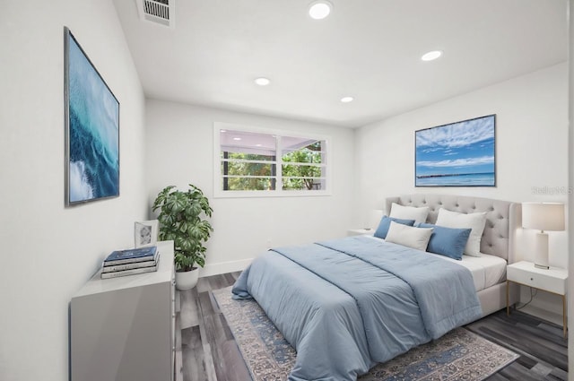 1119 Eau Claire Cir, Tampa, FL 33619 - bedroom with recessed lighting, wood finished floors, and baseboards
