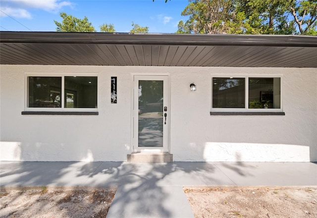 1119 Eau Claire Cir, Tampa, FL 33619 - entrance to property with stucco siding
