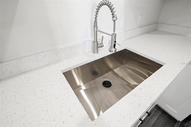 1119 Eau Claire Cir, Tampa, FL 33619 - kitchen view of a sink and light stone countertops