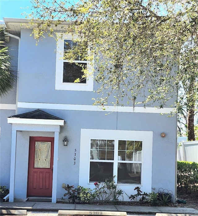 5303 Terraza Ct, Temple Terrace, FL 33617 - view of front of home with stucco siding