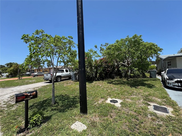 3730 NE 17th Ave, Pompano Beach, FL 33064 - view of front of home featuring a front lawn