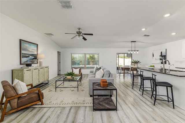 8812 Parsons Hill Blvd, Wesley Chapel, FL 33545 - living area with light wood-type flooring, recessed lighting, and ceiling fan