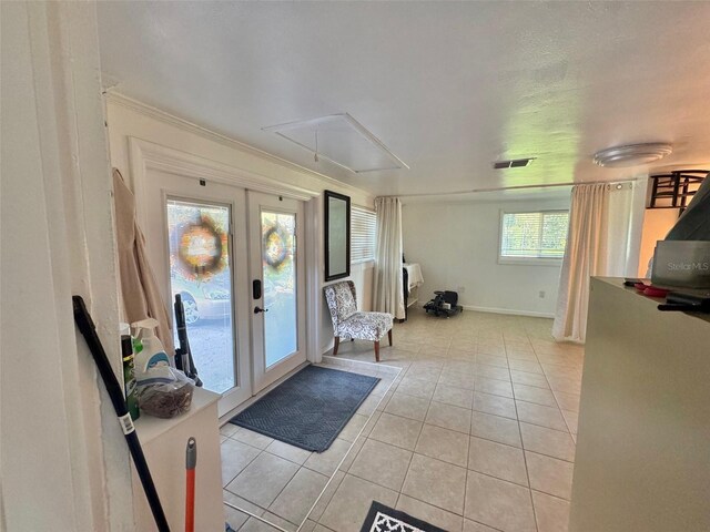 1423 Spruce Rd N, Lakeland, FL 33809 - entrance foyer featuring light tile patterned floors and french doors