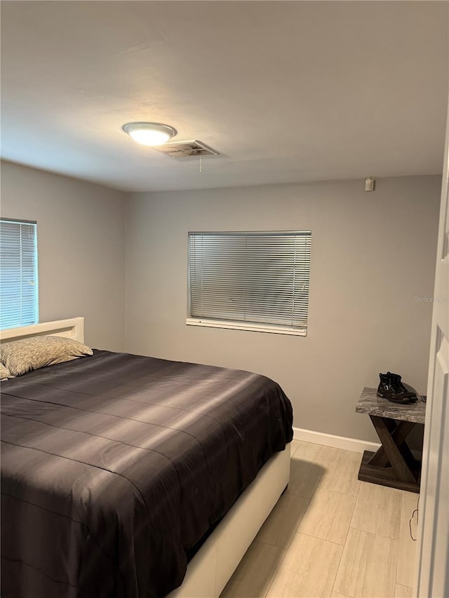 6345 Lambert Ln, New Port Richey, FL 34652 - bedroom with baseboards
